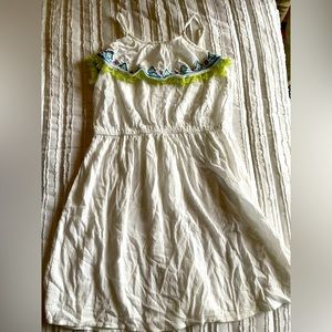 Super cute white beach cover up. Perfect for summer.